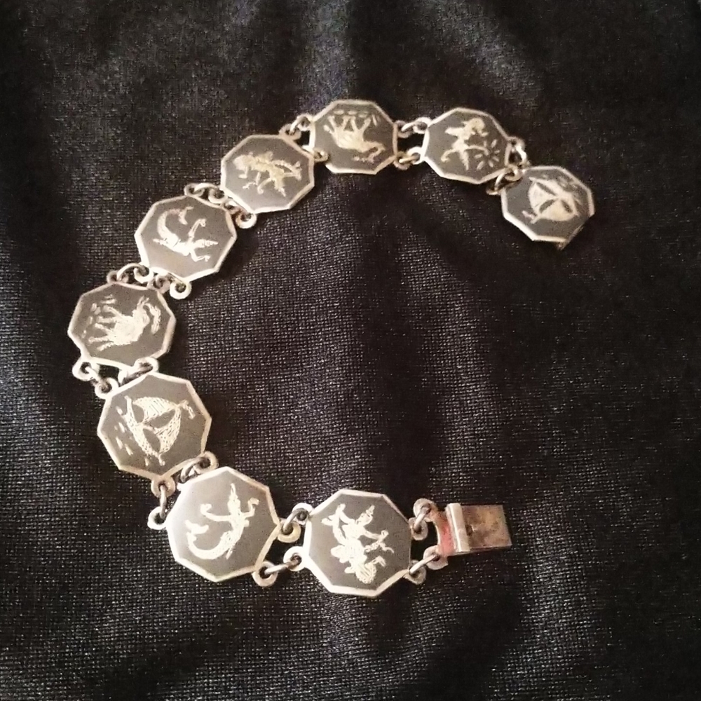 Vintage sterling siam Hindu Motif link